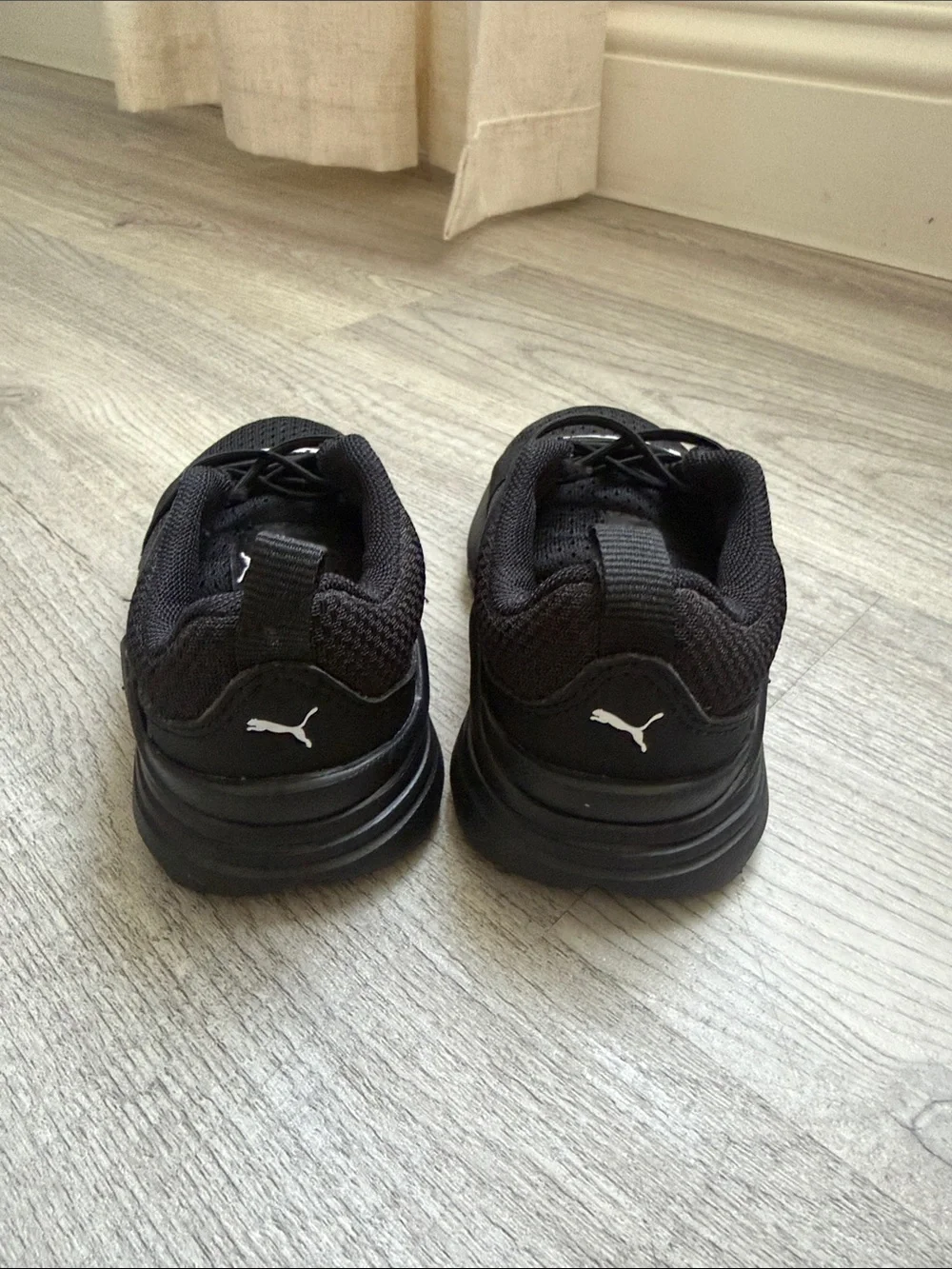 Puma Kids Black Slip-On Sneakers with Bold Logo